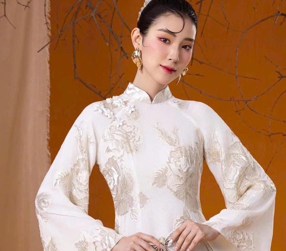 Vietnamese ao dai GoldHoaHong imprint 3D texture with gold aodai white traditional style, pants included