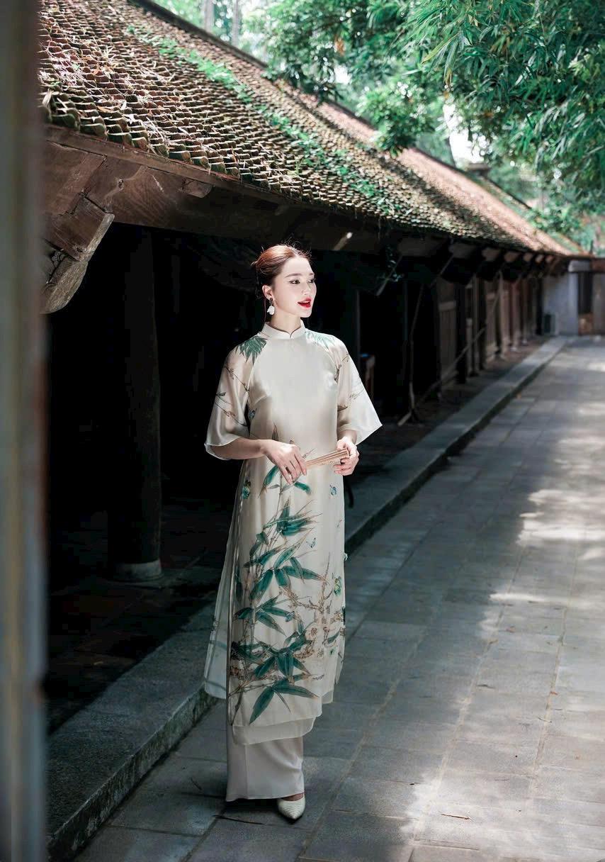 TrucHy Vietnamese ao dai ivory and blue, pants included