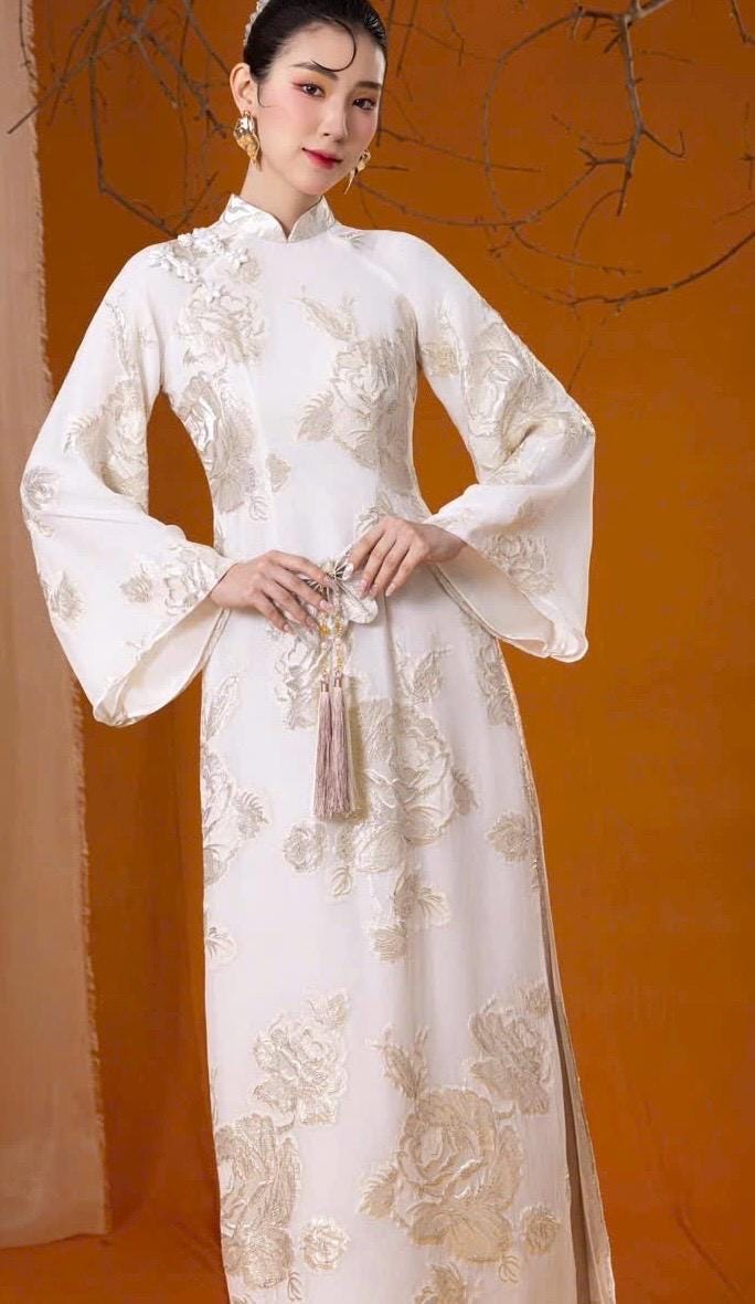 Vietnamese ao dai GoldHoaHong imprint 3D texture with gold aodai white traditional style, pants included