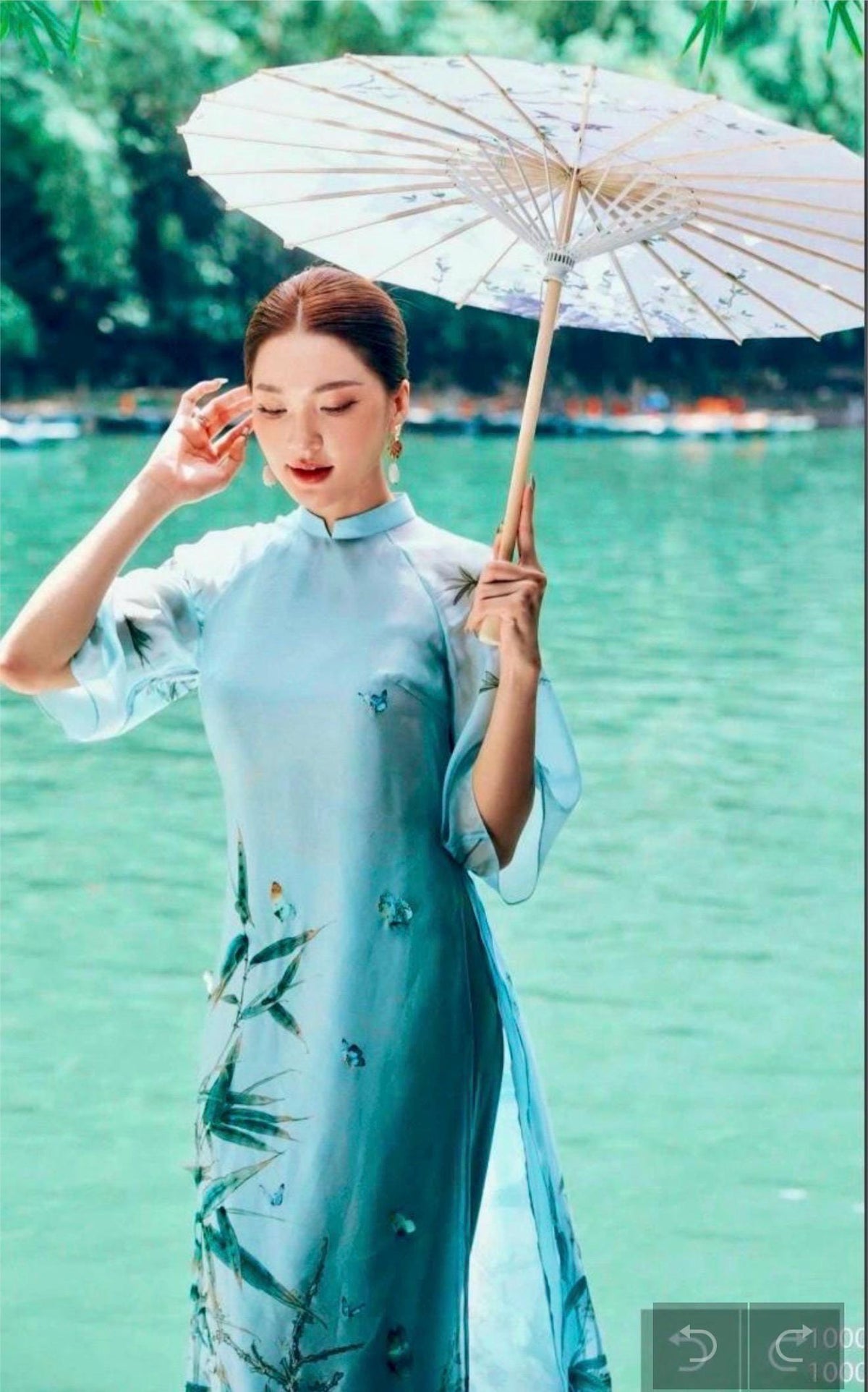 TrucHy Vietnamese ao dai ivory and blue, pants included