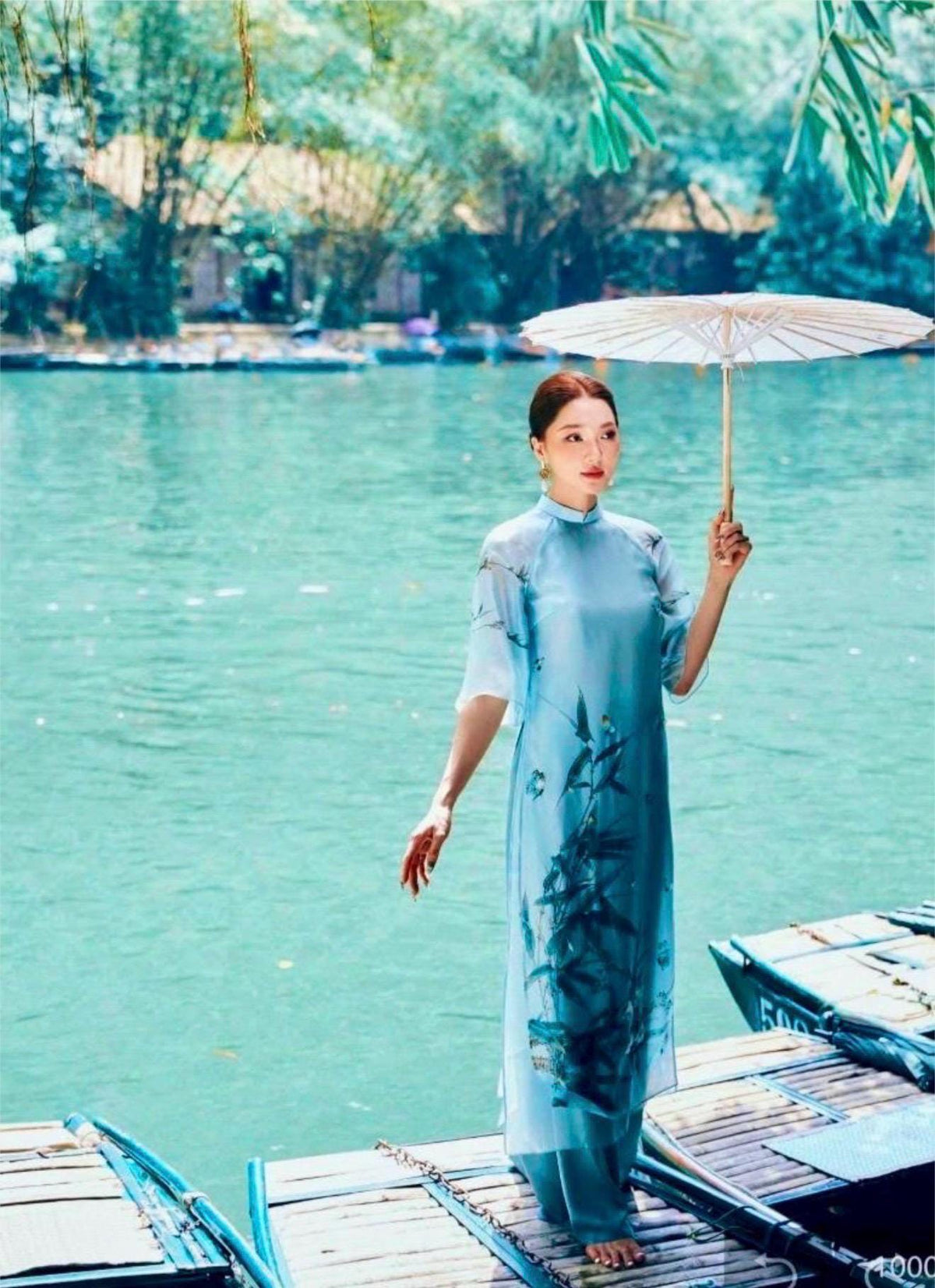 TrucHy Vietnamese ao dai ivory and blue, pants included
